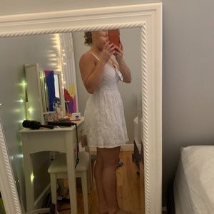 White mini dress with bow on front